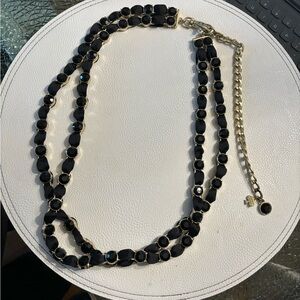 Kate Spade, 30” necklace. Gold with black stones and woven ribbon.